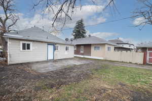 Rear view of property with a patio area