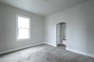 View of carpeted spare room