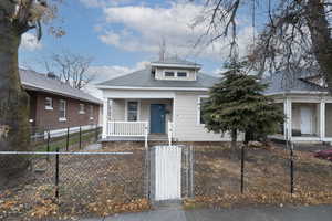 Bungalow-style home with a porch