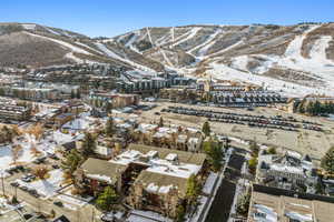 Snowy aerial view with a mountain view