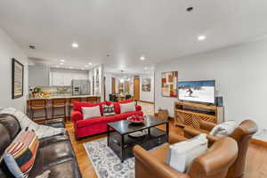 Living room with light wood-type flooring