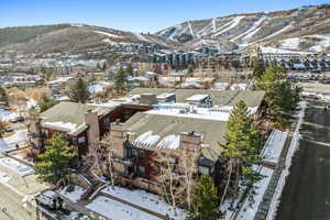 Snowy aerial view with a mountain view