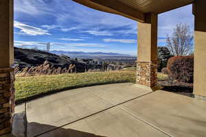 View of patio with a mountain view