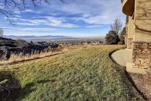 View of yard with a patio area and a mountain view