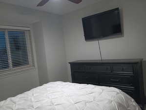 Bedroom featuring ceiling fan