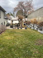 View of yard featuring a fire pit and a patio