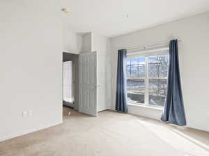 View of carpeted spare room