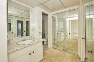 Bathroom with vanity and toilet