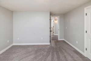 View of carpeted spare room