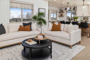 Living room with light wood-type flooring