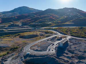 Birds eye view of property with a mountain view