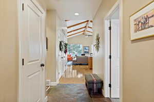 Hall with vaulted ceiling with beams