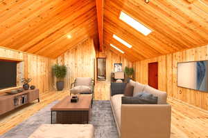 Living room featuring high vaulted ceiling, a skylight, light hardwood / wood-style flooring, and wood walls