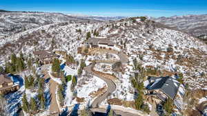 Snowy aerial view with a mountain view