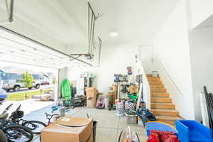 Garage featuring a garage door opener