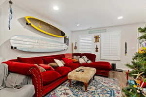 Living room featuring wood-type flooring