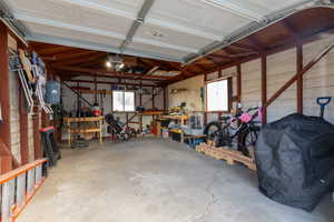 Garage featuring a workshop area