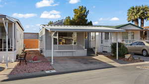 View of front of home featuring covered porch