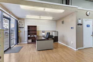 Office space featuring light hardwood / wood-style flooring