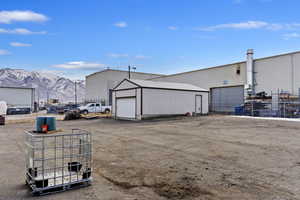 Exterior space featuring a mountain view and a garage