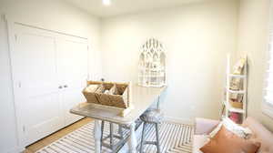 Mudroom with light hardwood / wood-style flooring