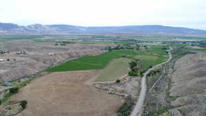 Drone / aerial view featuring a mountain view and a rural view