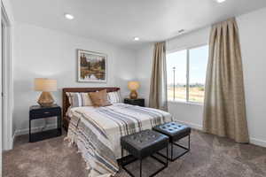 Bedroom featuring carpet floors