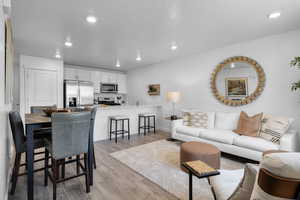 Living room featuring laminate flooring