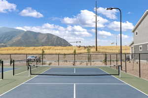 View of sport court featuring a mountain view