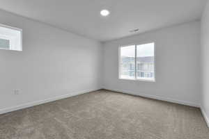 View of carpeted spare room