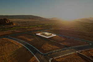 Aerial view at dusk featuring a mountain view