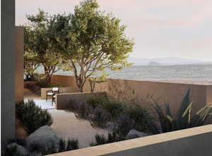 Yard at dusk featuring a patio area and a water and mountain view