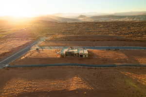 Aerial view at dusk featuring a mountain view