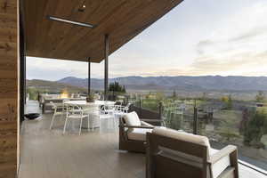 Deck at dusk with a mountain view