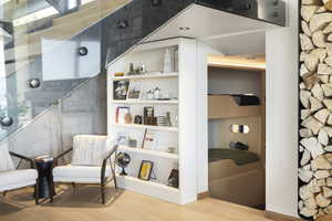 Sitting room featuring wood-type flooring