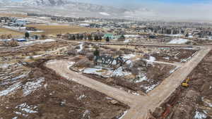 Snowy aerial view with a mountain view