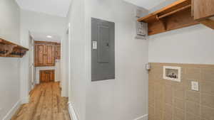 Clothes washing area with washer hookup, and gas dryer hookup