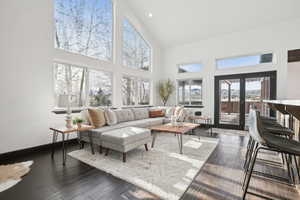 Sunroom / solarium featuring french doors