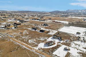 Snowy aerial view with a mountain view