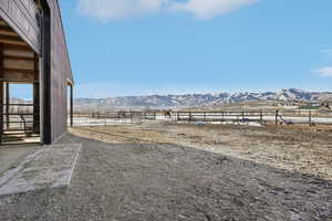 View of yard featuring a mountain view and a rural view