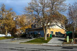 View of front of home with a garage