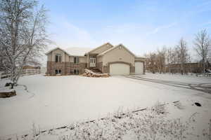 View of front facade with a garage