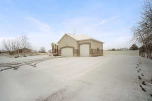 View of home's exterior with a garage