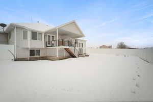 View of snow covered property