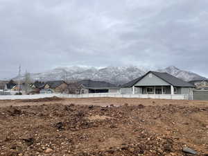 View of yard with a mountain view