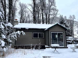 View of snow covered property