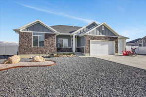 View of front of home featuring a garage