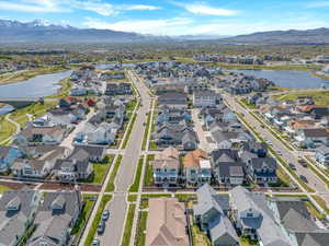 Aerial view featuring a water and mountain view