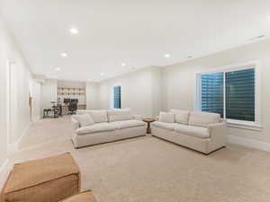 Living room with light colored carpet