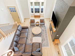 Living room with hardwood / wood-style floors